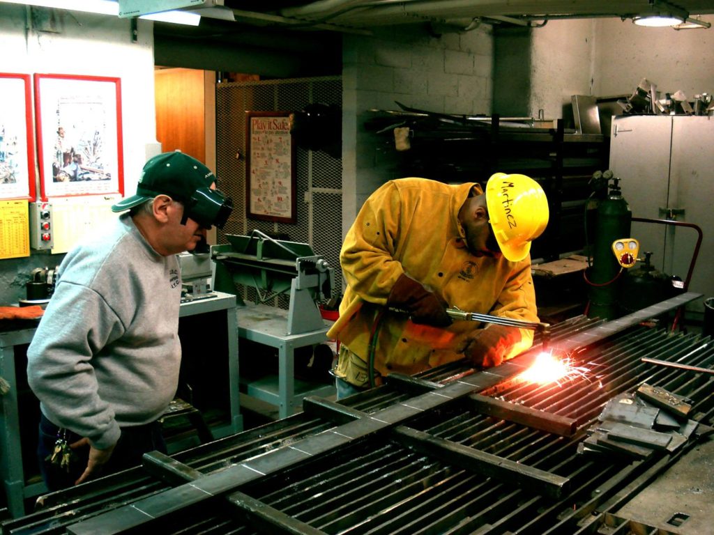 Job seekers learn to weld through a program supported by the NYC Workforce Funders